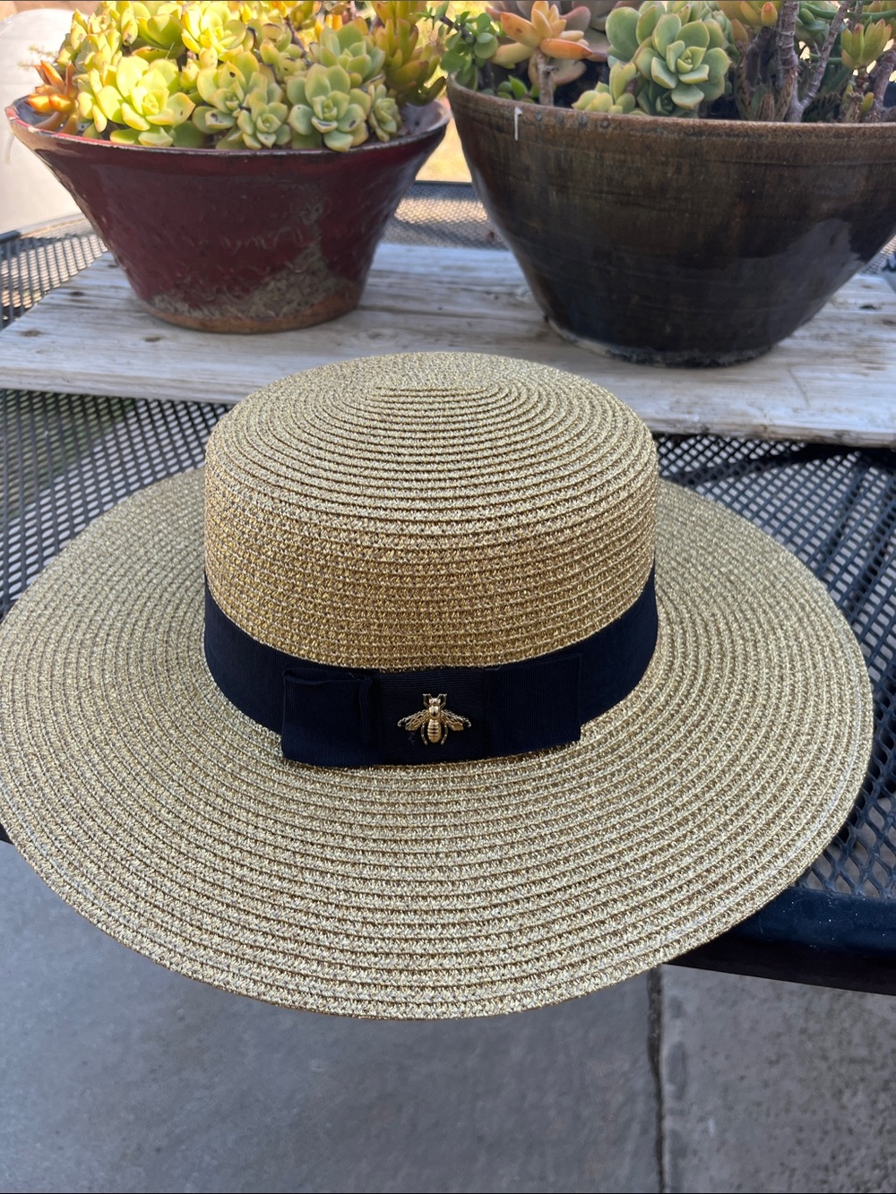 Gold Straw Wide-Brim Hat with Black Ribbon and Bee Accent